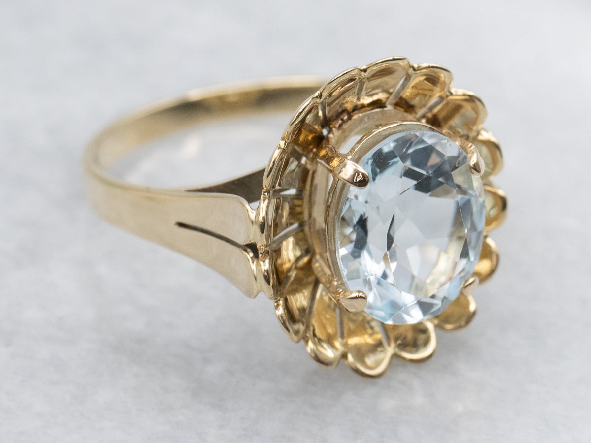 Oval-Cut Blue Topaz in Vintage Golden Floral Cocktail Setting