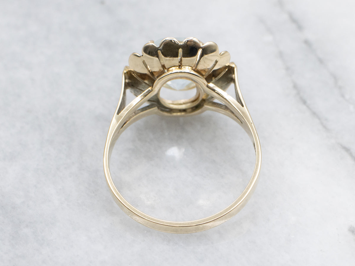 Oval-Cut Blue Topaz in Vintage Golden Floral Cocktail Setting