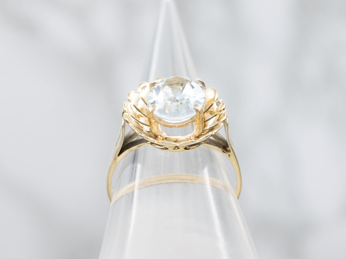 Oval-Cut Blue Topaz in Vintage Golden Floral Cocktail Setting
