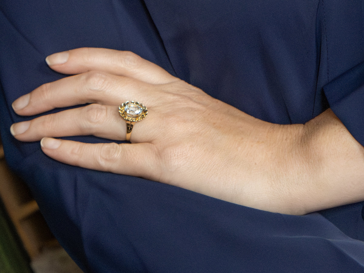 Oval-Cut Blue Topaz in Vintage Golden Floral Cocktail Setting