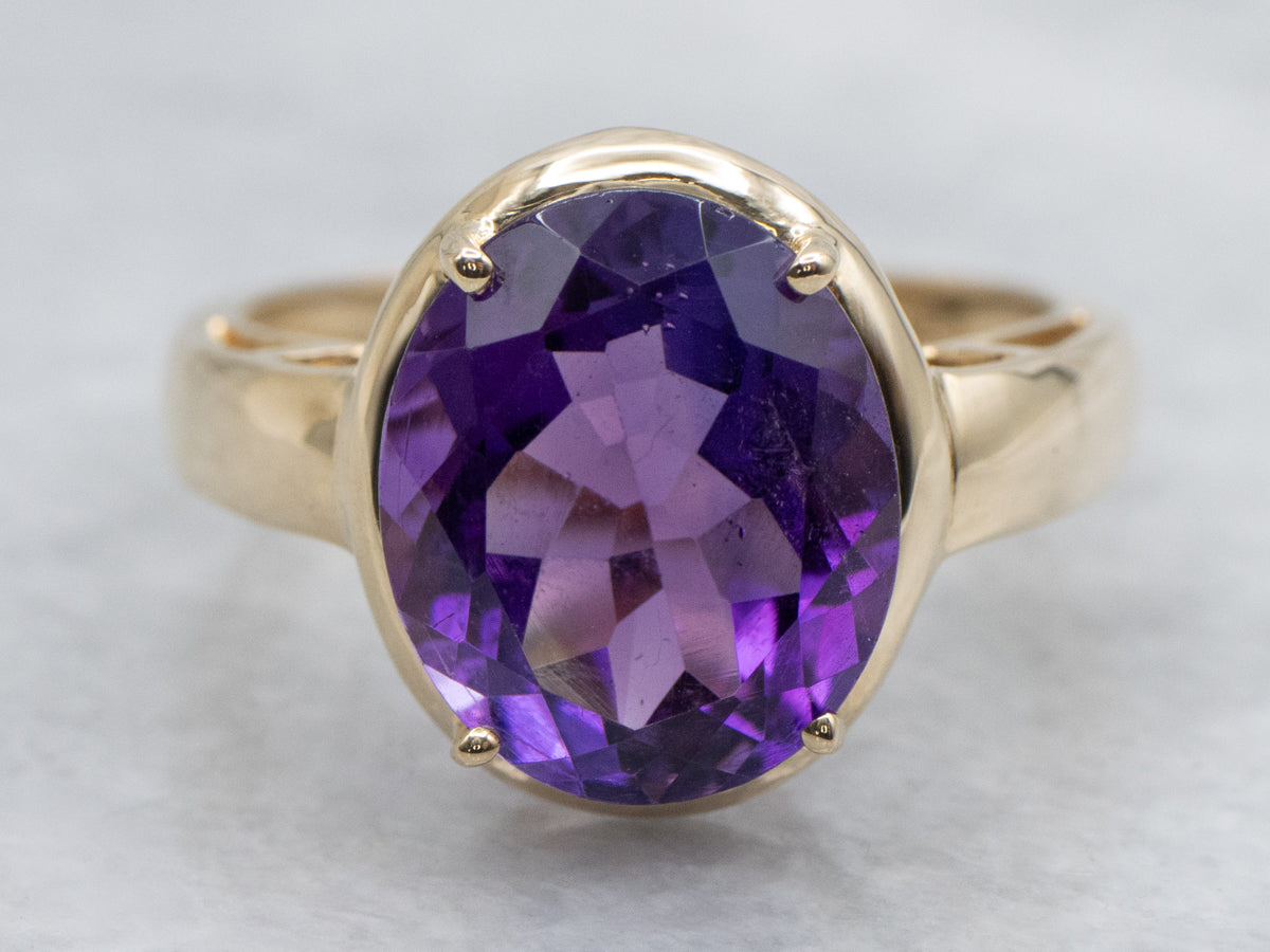 Oval Cut Amethyst Yellow Gold Solitaire Ring