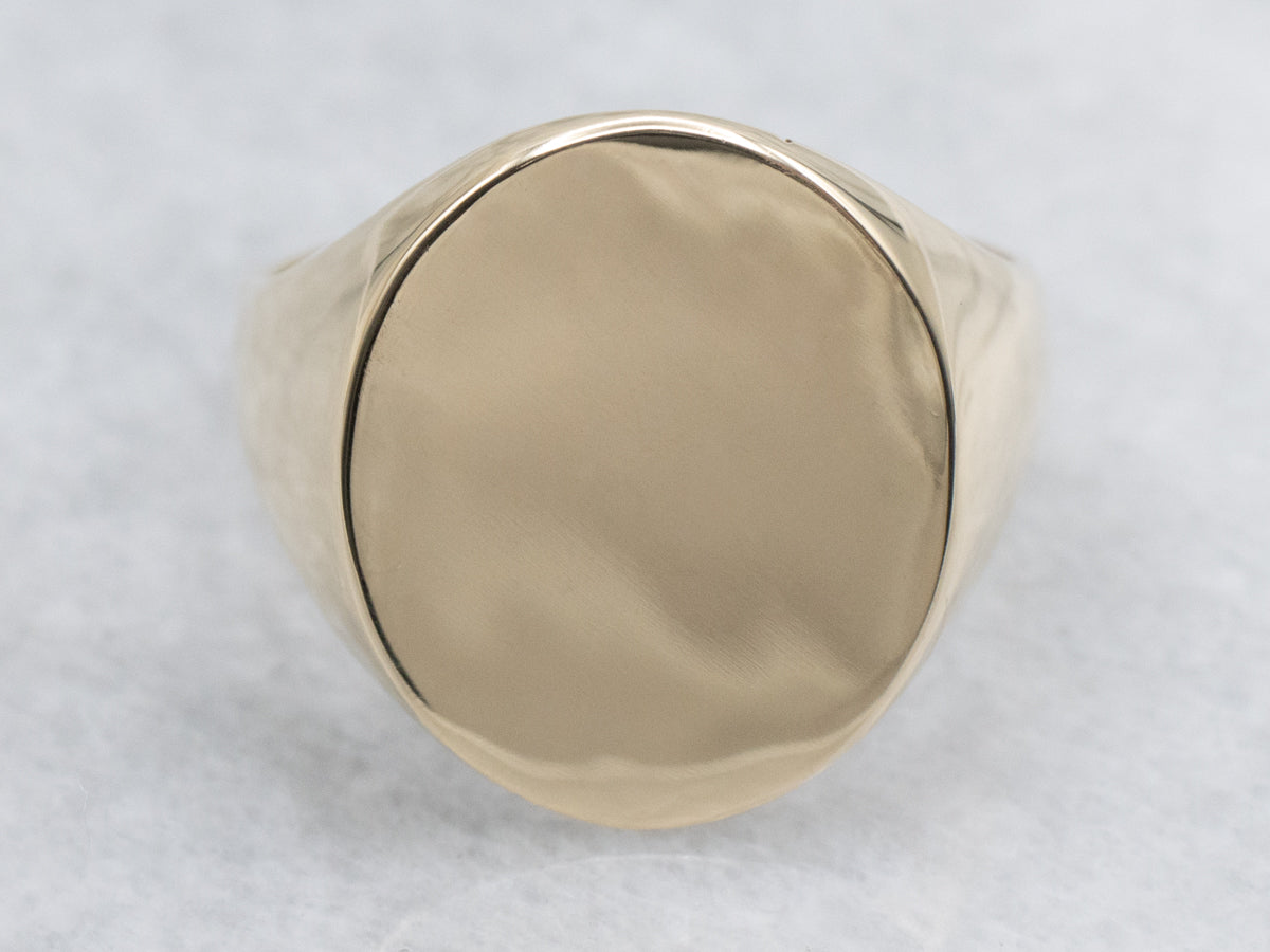 Plain Oval-Top Yellow Gold Signet Ring