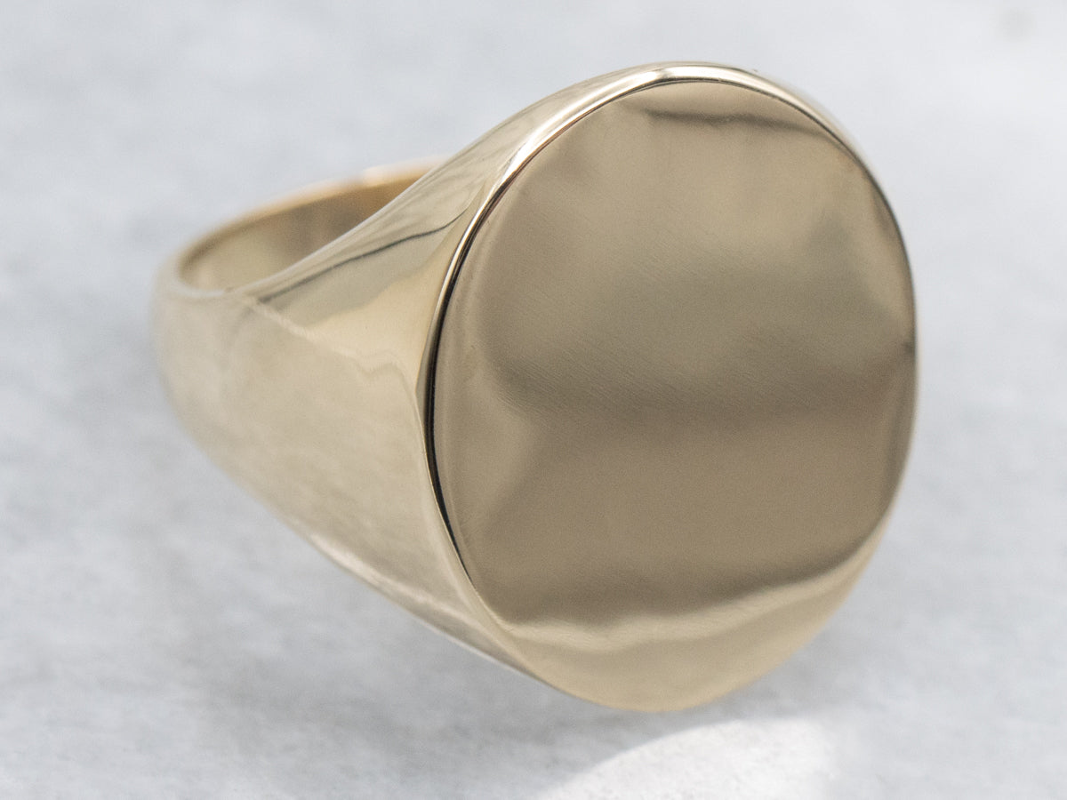 Plain Oval-Top Yellow Gold Signet Ring