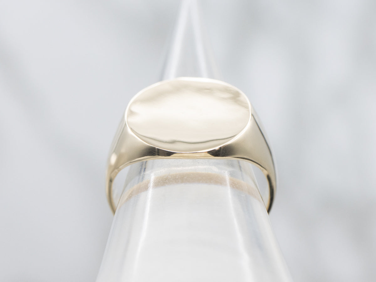 Plain Oval-Top Yellow Gold Signet Ring