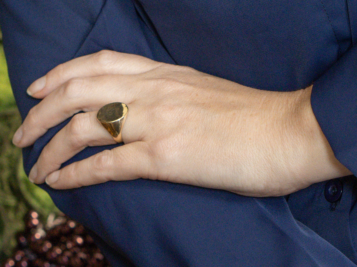 Plain Oval-Top Yellow Gold Signet Ring