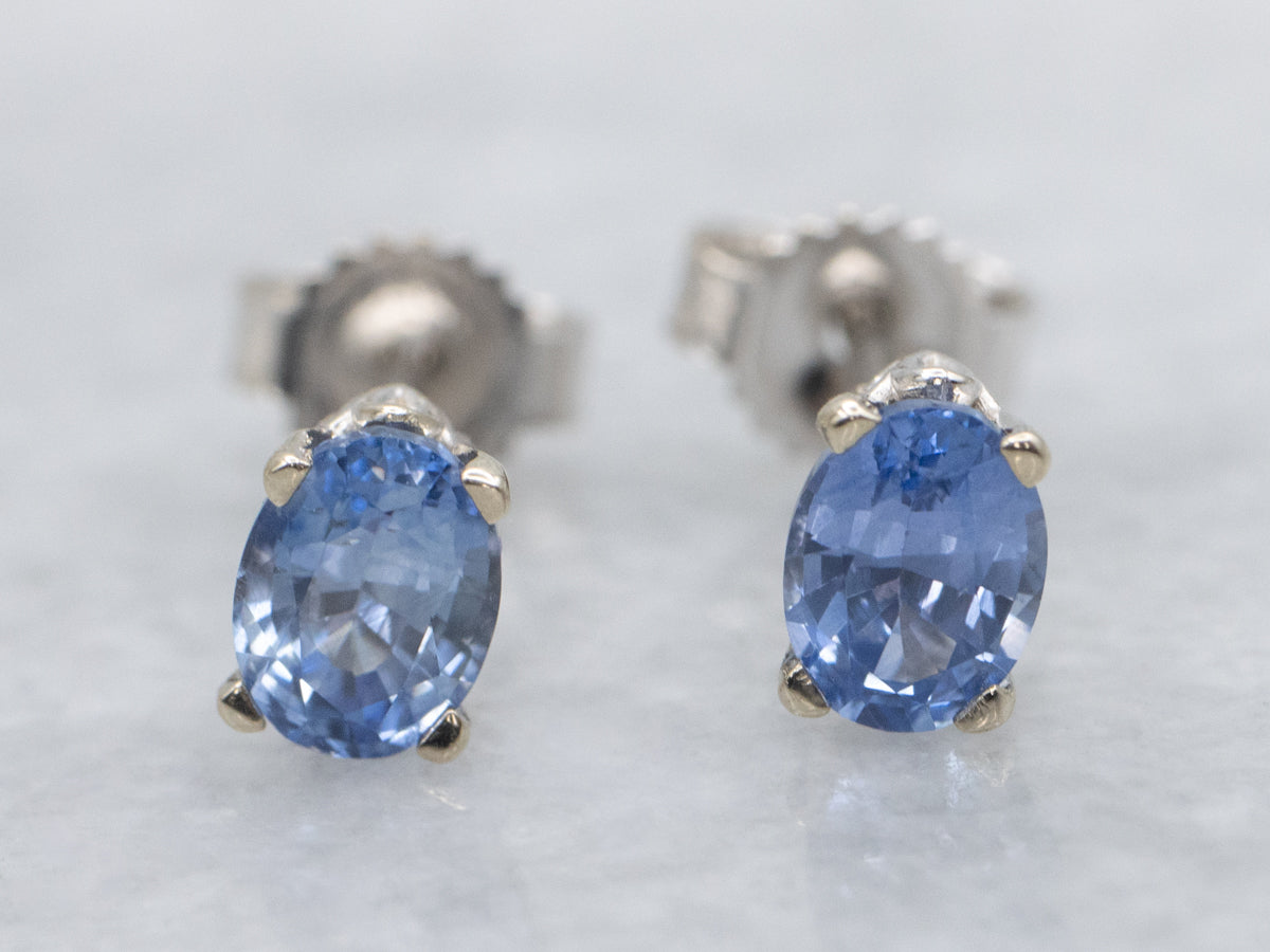 Oval Cut Light Blue Sapphire Stud Earrings