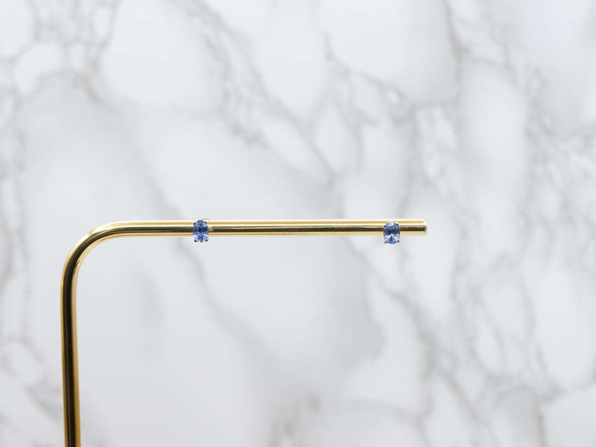 Oval Cut Light Blue Sapphire Stud Earrings