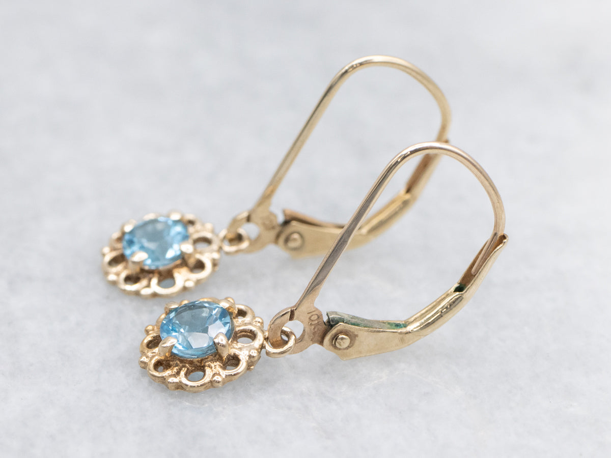 Sparkling Blue Topaz Yellow Gold Drop Earrings