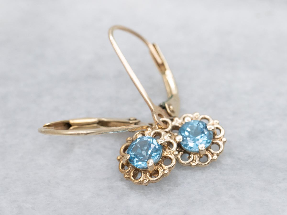Sparkling Blue Topaz Yellow Gold Drop Earrings