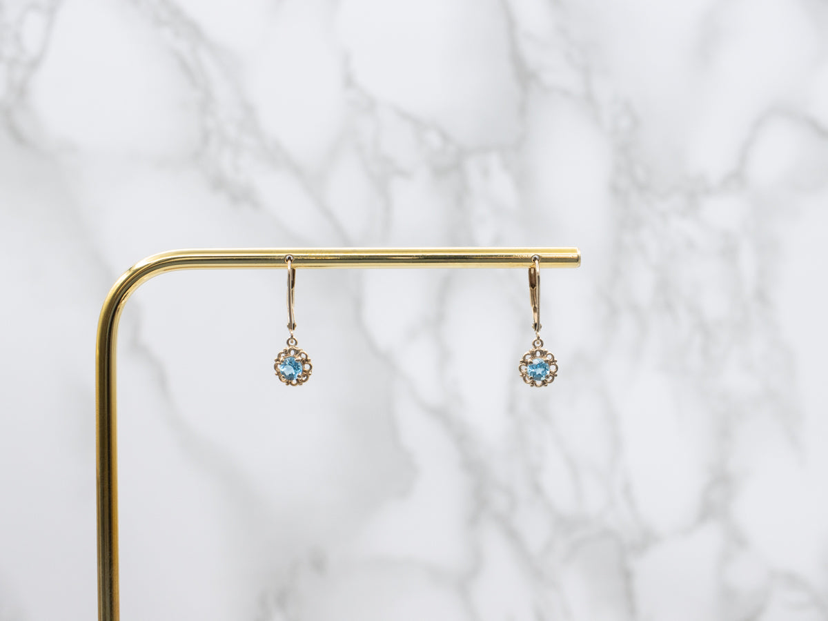 Sparkling Blue Topaz Yellow Gold Drop Earrings