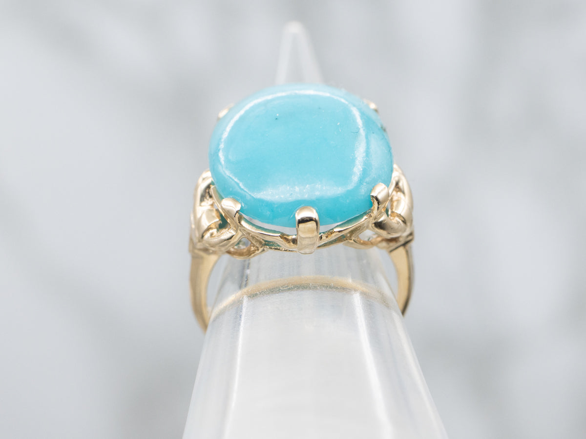 Oval Cut Turquoise Cabochon in Vintage Gold Setting