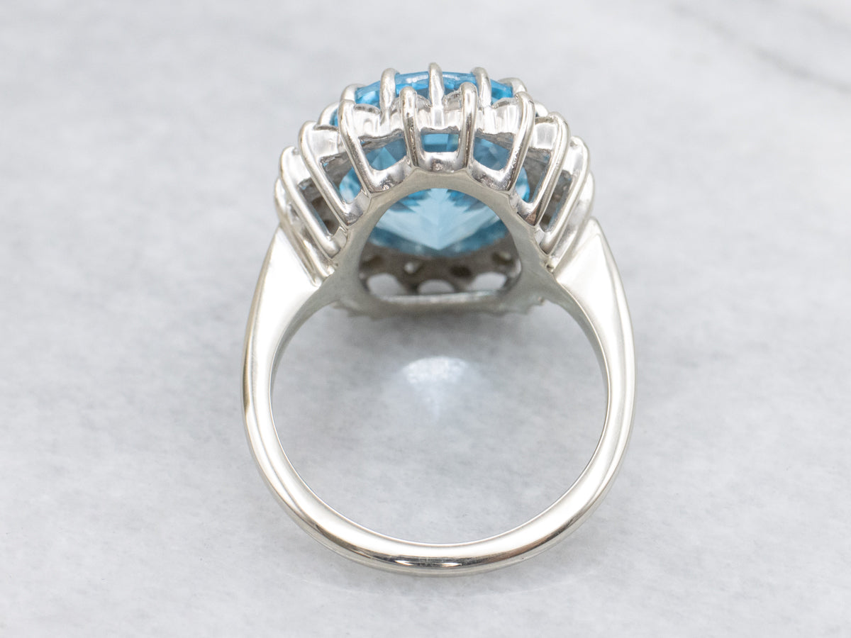 White Gold Blue Topaz and Diamond Halo Cocktail Ring