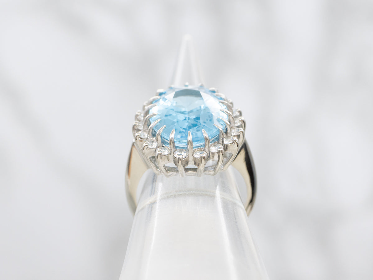 White Gold Blue Topaz and Diamond Halo Cocktail Ring