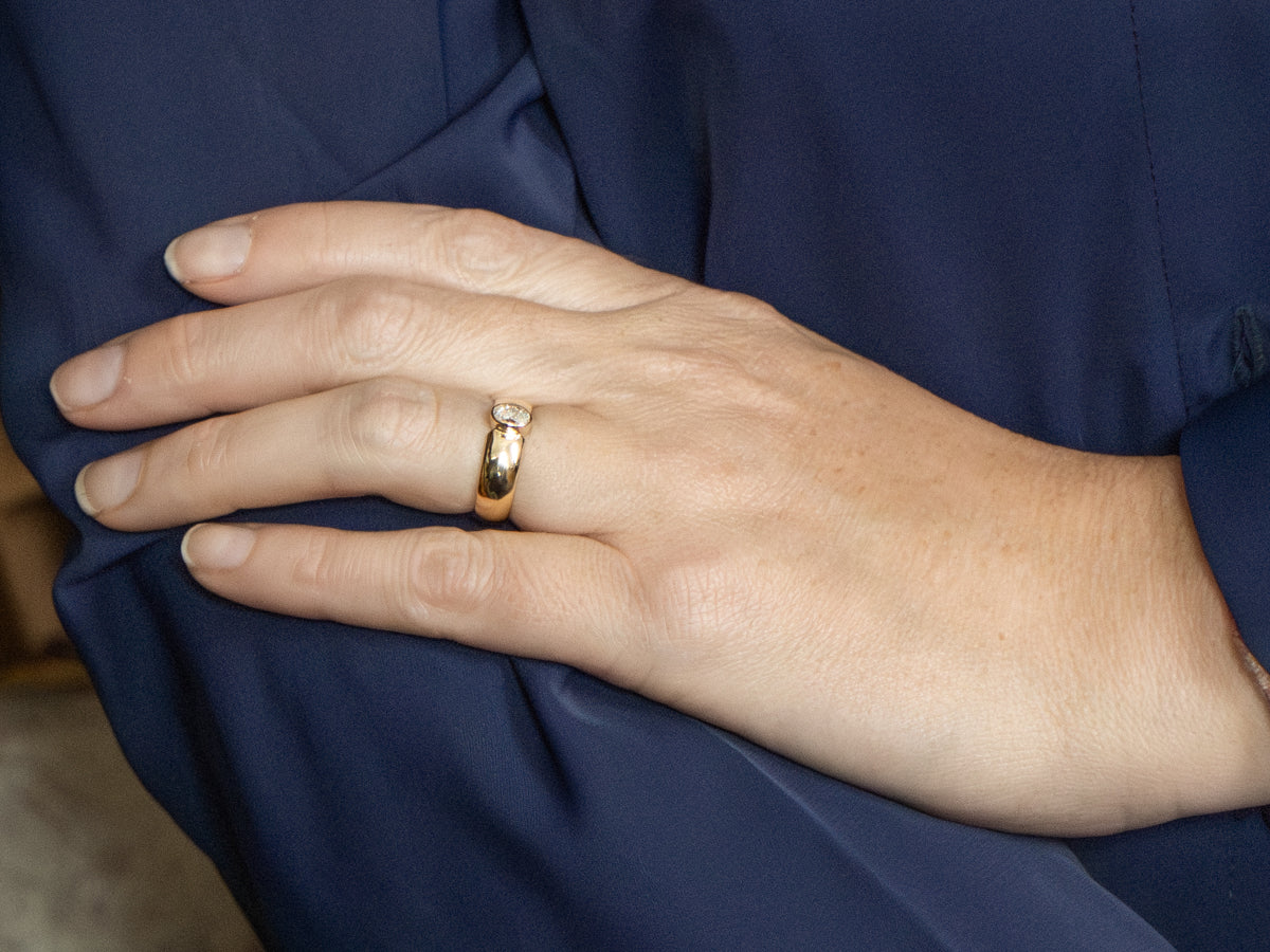 Oval Cut Bezel-Set Diamond Solitaire Engagement Ring