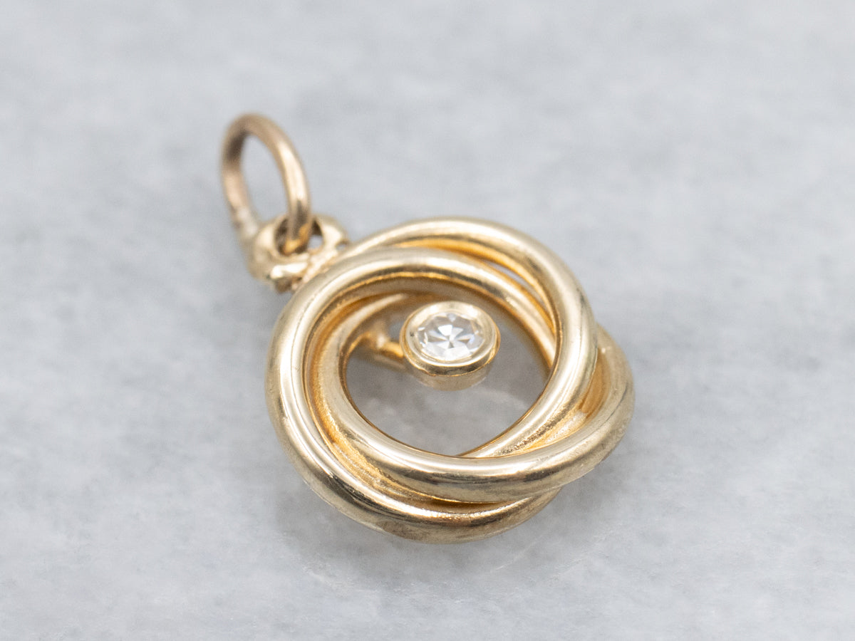 Twisting Bezel Set Diamond Gold Pendant