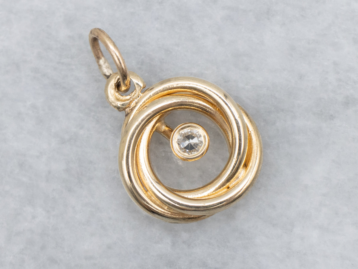 Twisting Bezel Set Diamond Gold Pendant