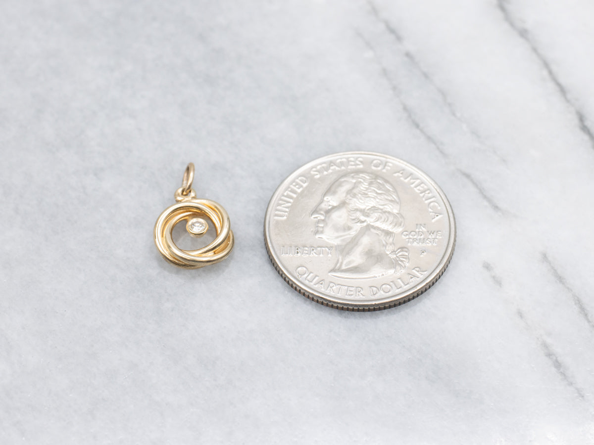 Twisting Bezel Set Diamond Gold Pendant