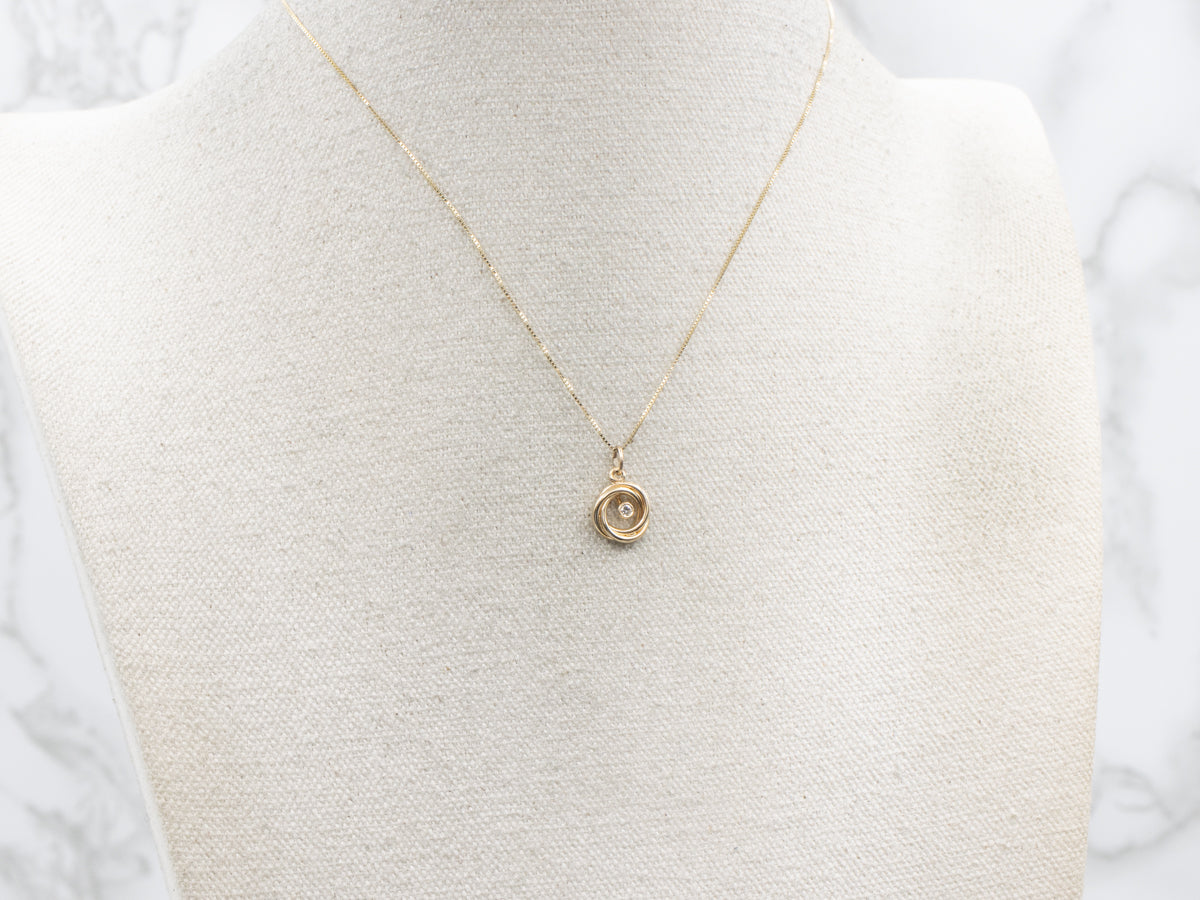 Twisting Bezel Set Diamond Gold Pendant