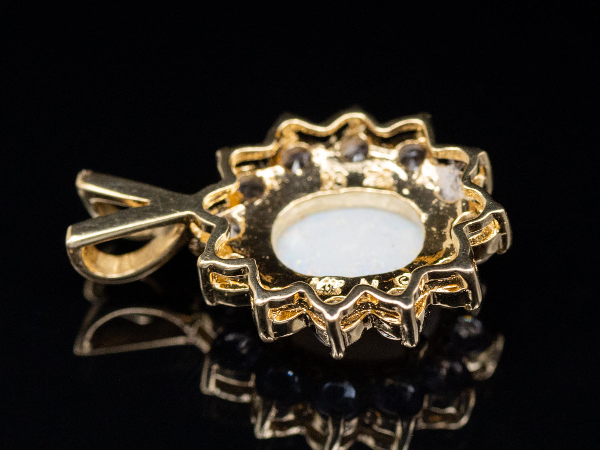 Opal and Tanzanite Gold Halo Pendant