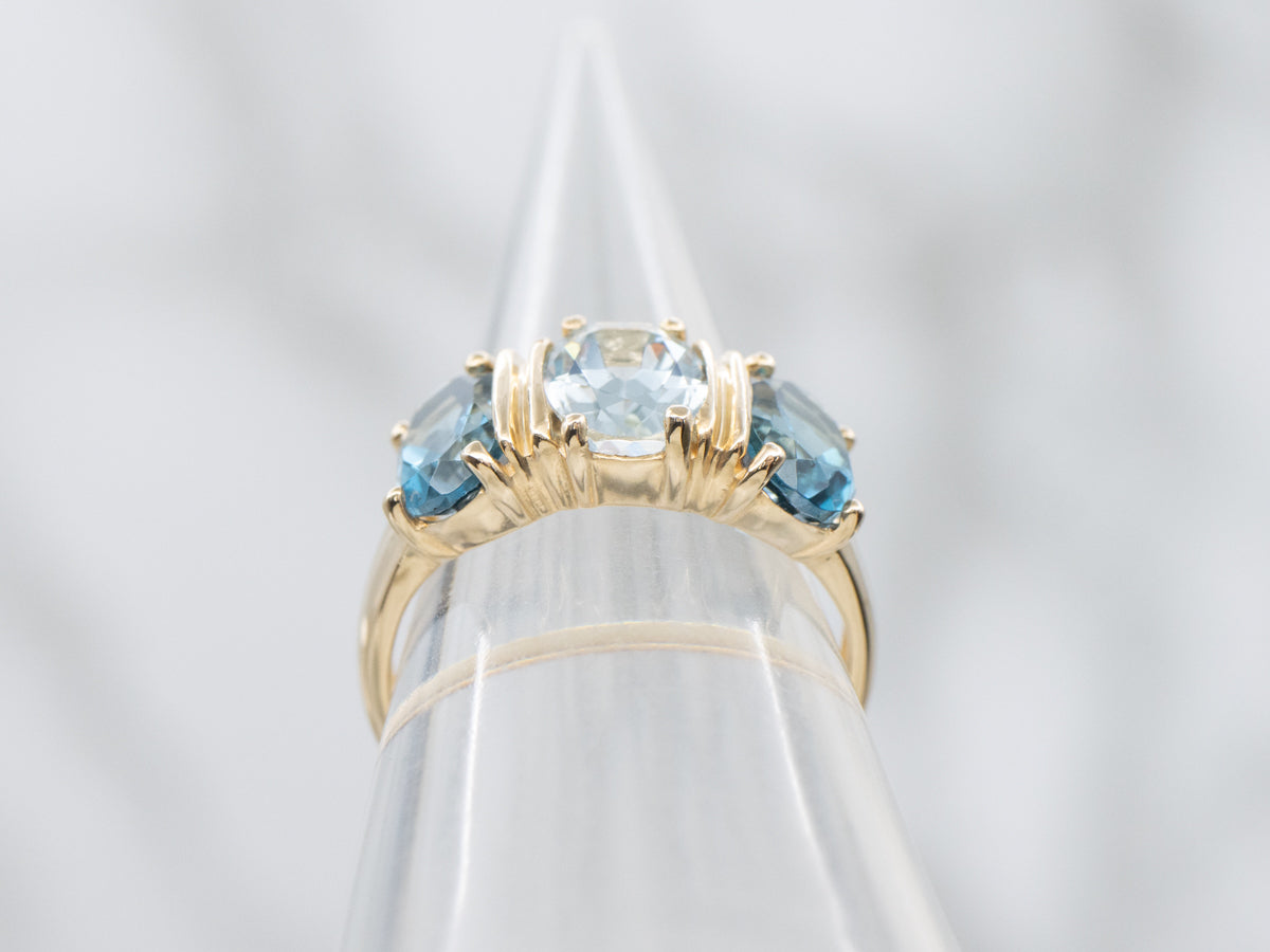 Blue Tones Aquamarine and Topaz Three Stone Ring