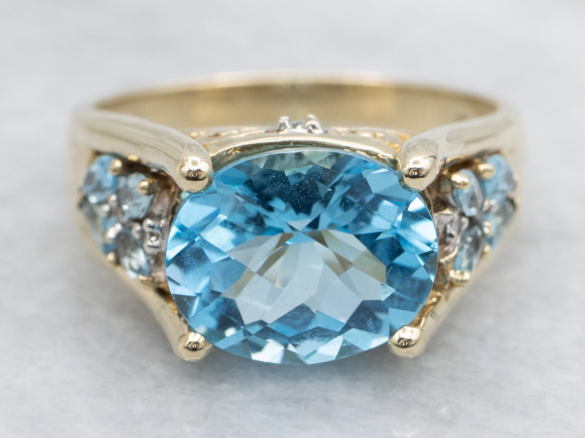 East-to-West Set Blue Topaz and Diamond Gold Cocktail Ring