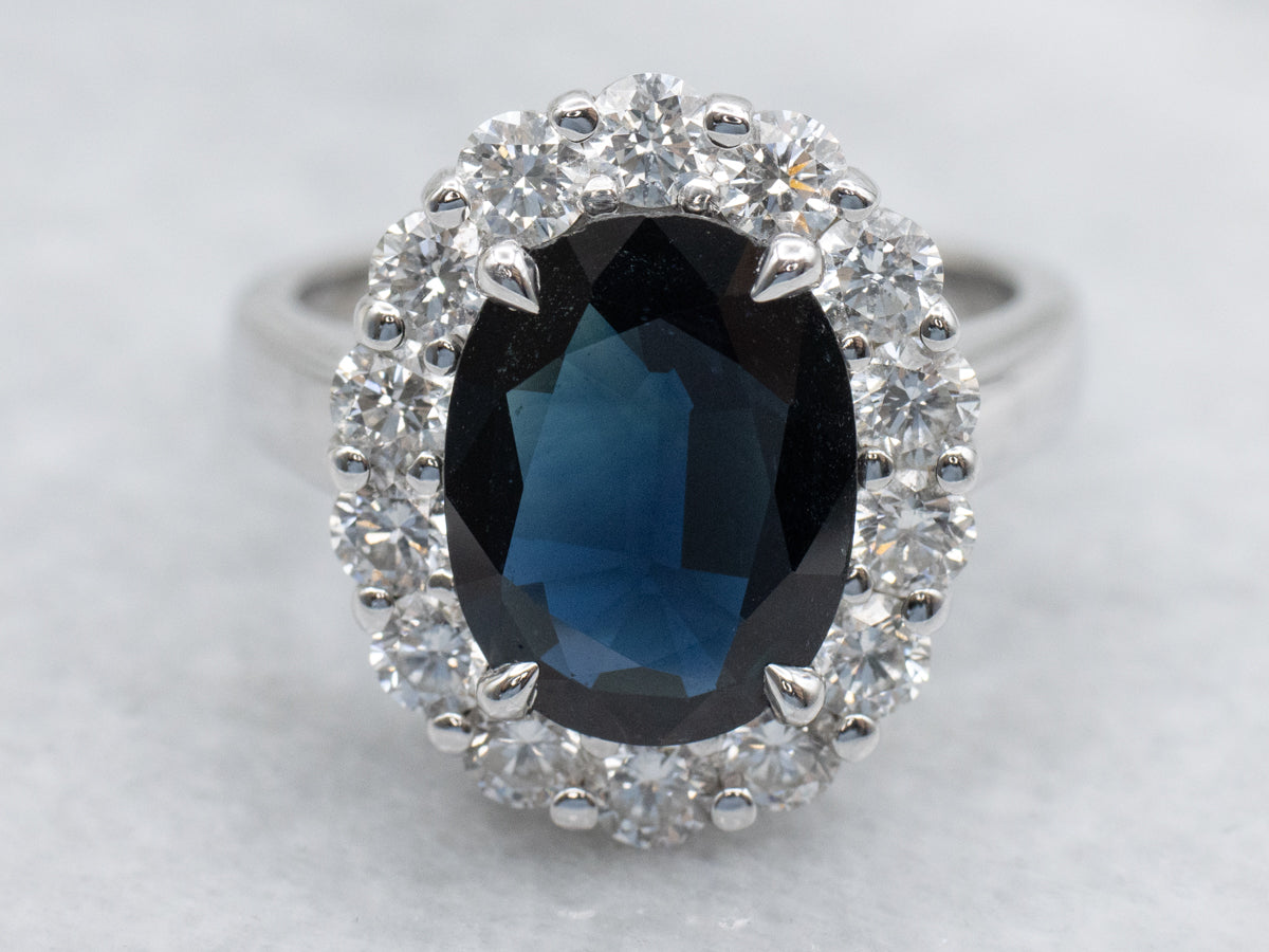 Deep Blue Sapphire and Diamond Modern Halo Ring