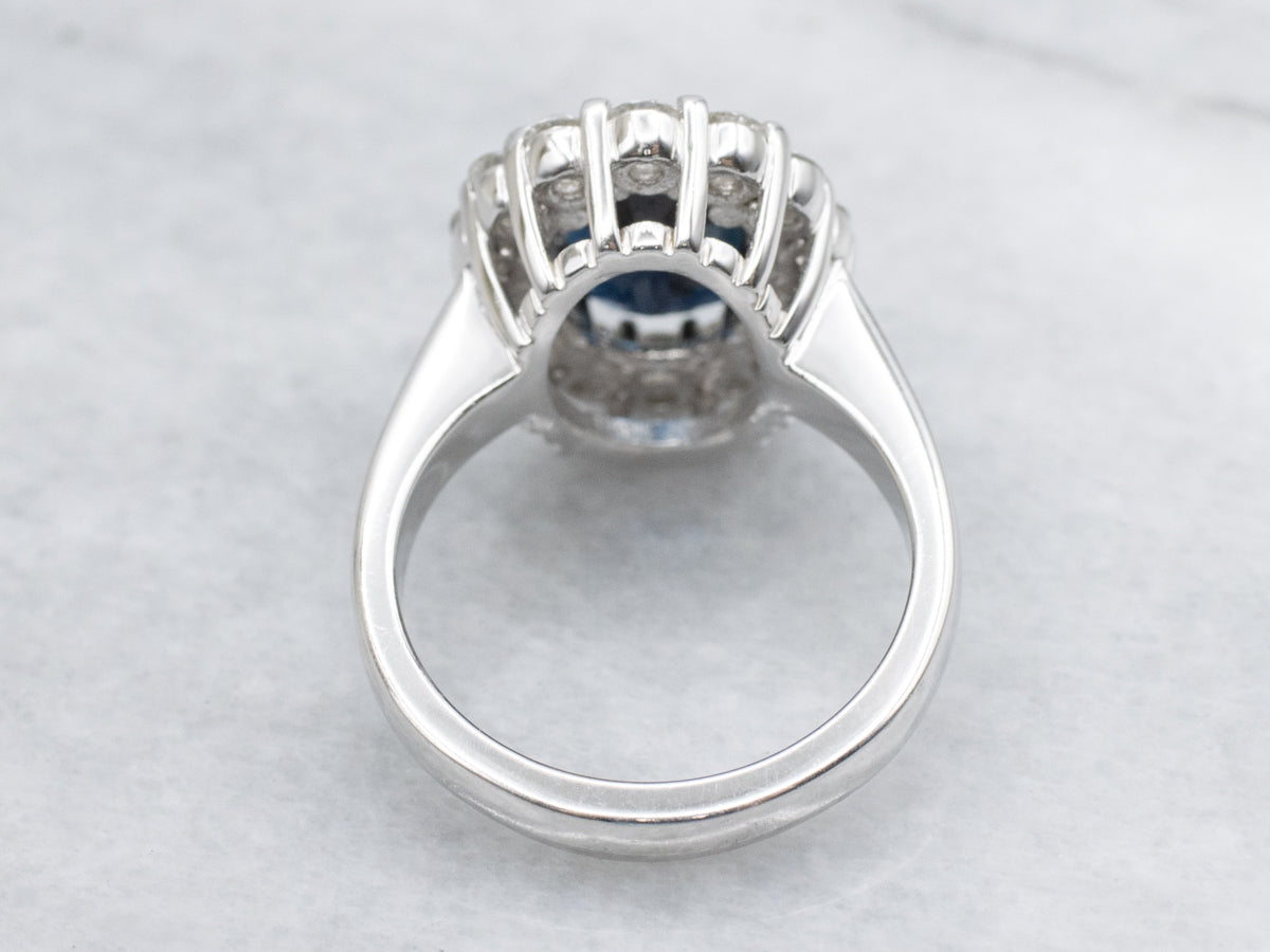 Deep Blue Sapphire and Diamond Modern Halo Ring
