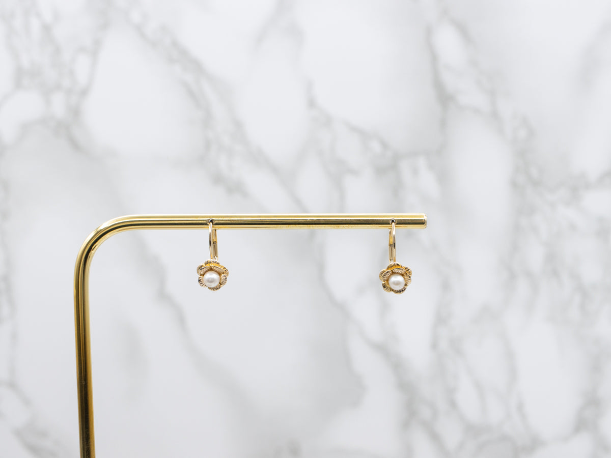 White Pearl Drop Earrings in Pretty Gold Flower Settings