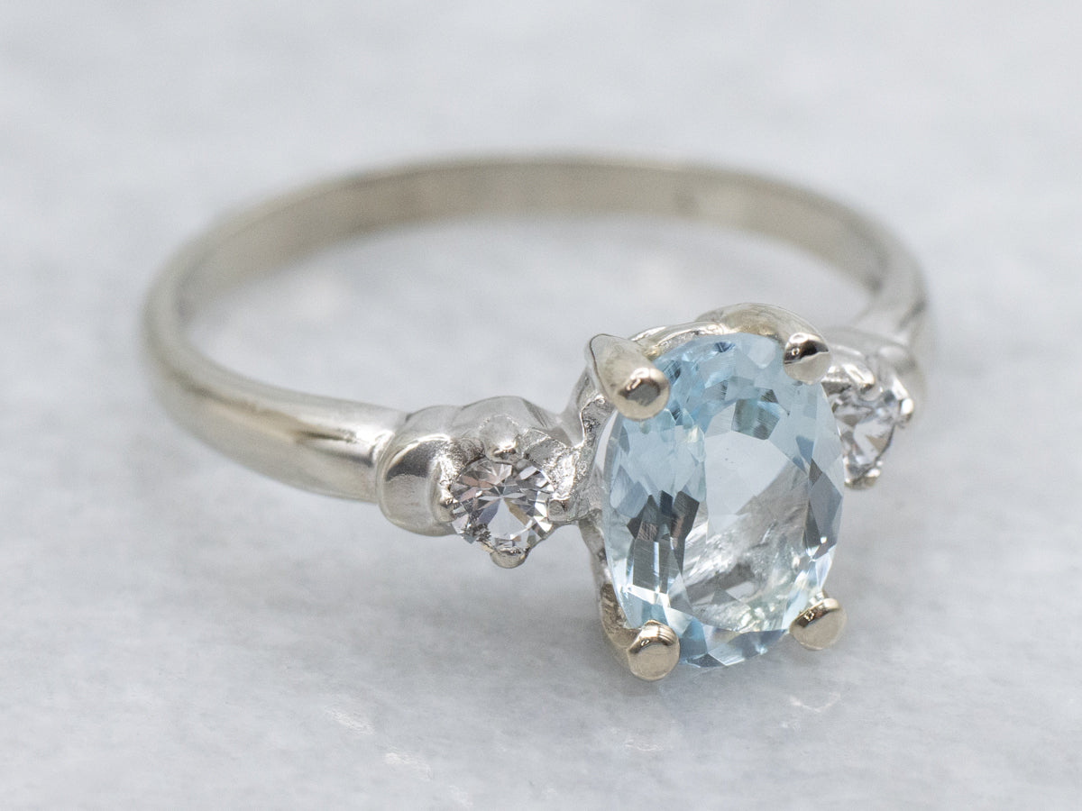 Aquamarine and White Spinel Three Stone Ring
