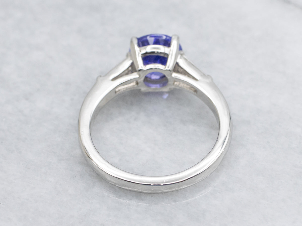 Round-Cut Tanzanite in Retro Era Platinum and Diamond Setting