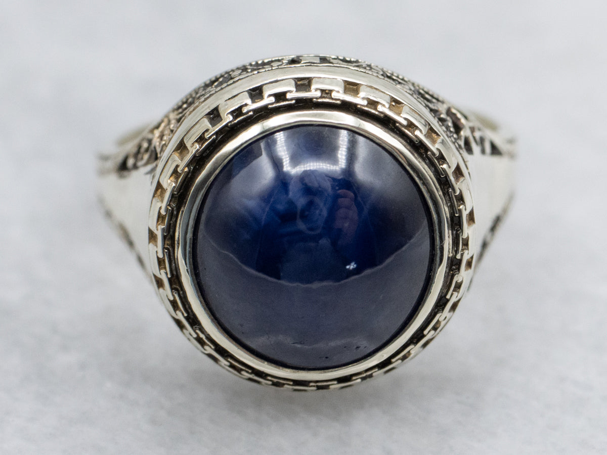 Antique Josten's Sapphire Cabochon Filigree Solitaire Ring