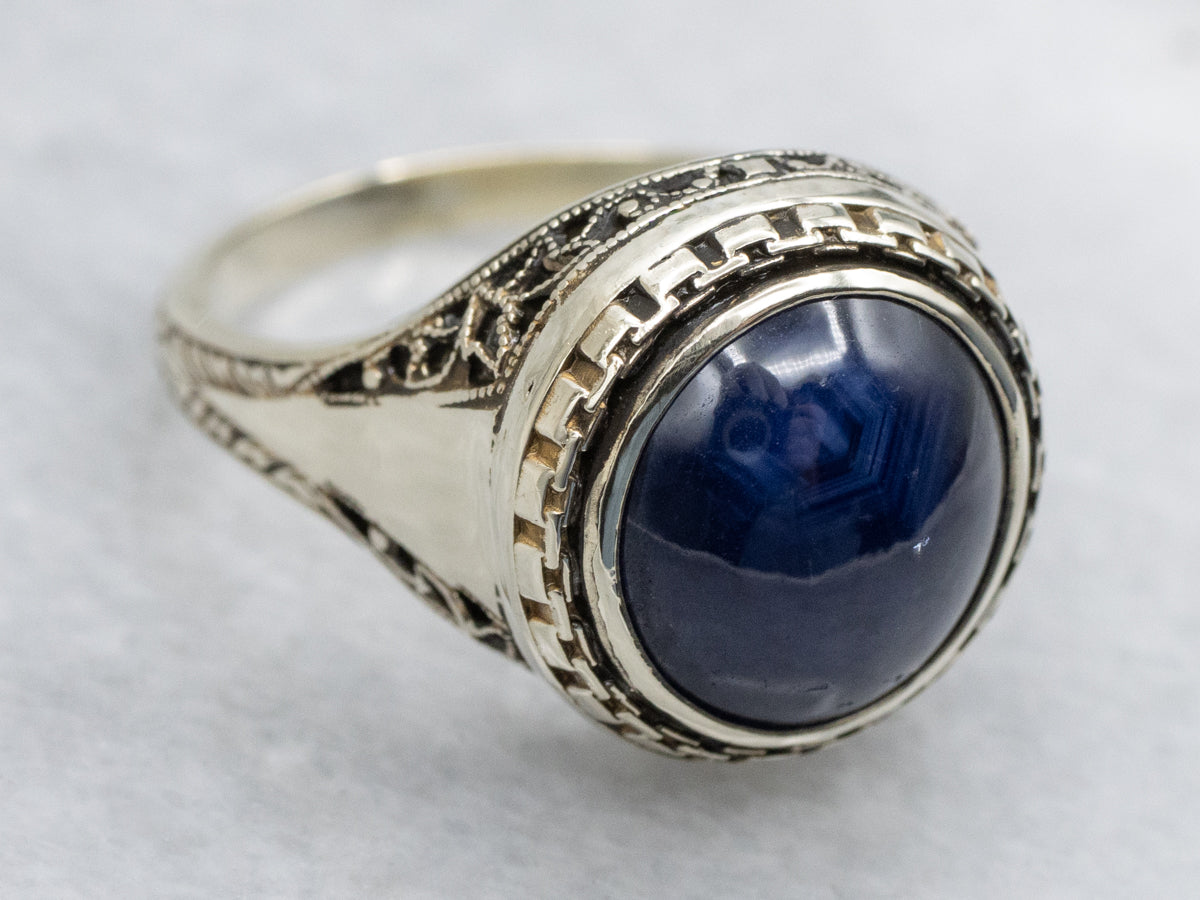 Antique Josten's Sapphire Cabochon Filigree Solitaire Ring