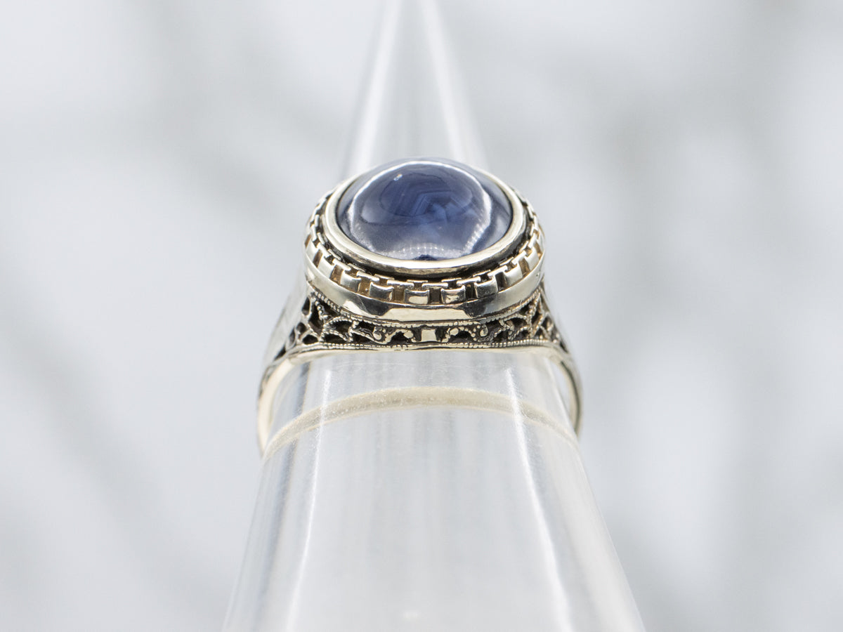 Antique Josten's Sapphire Cabochon Filigree Solitaire Ring