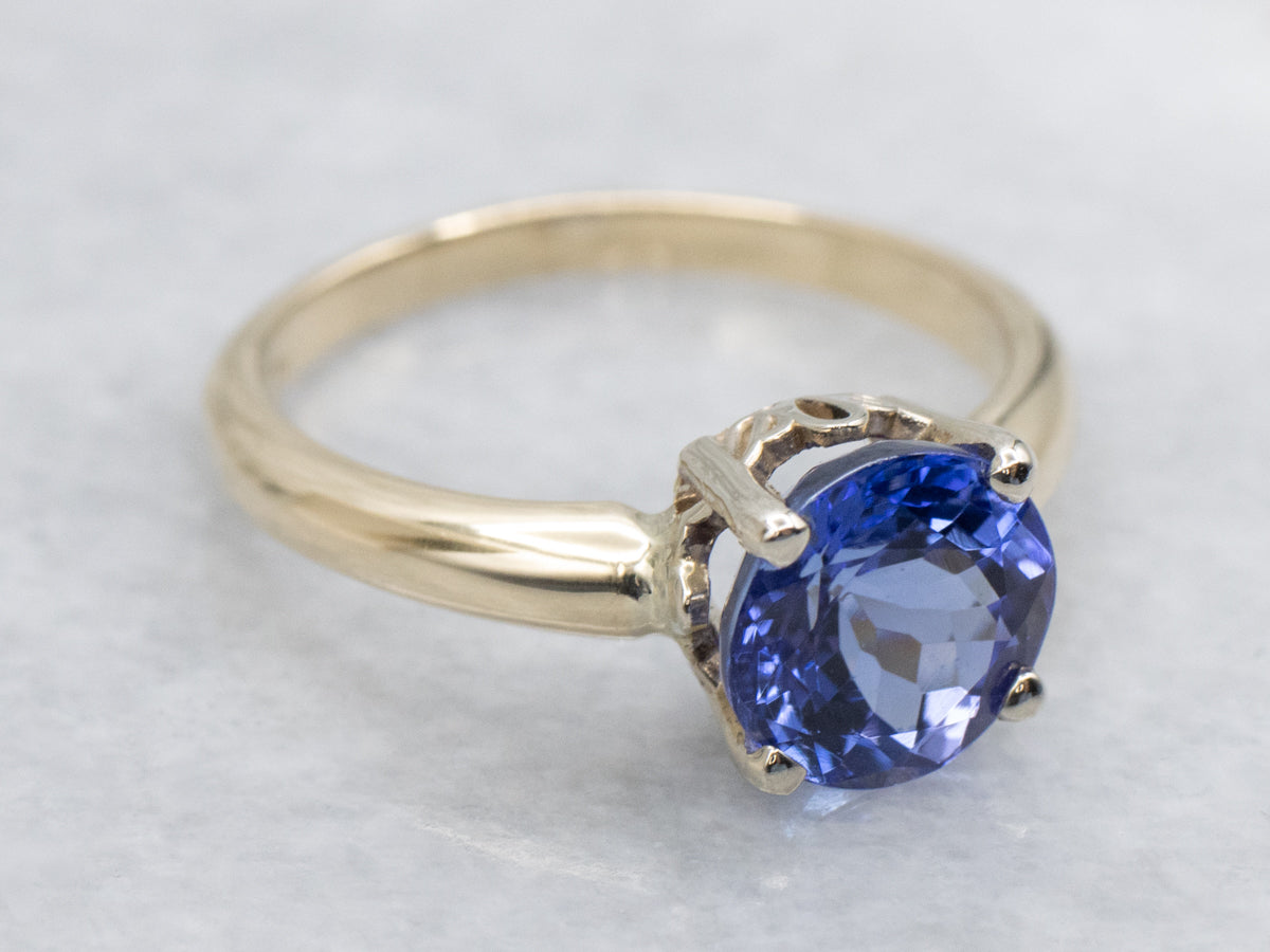 Round Cut Tanzanite Two Tone Gold Solitaire Ring
