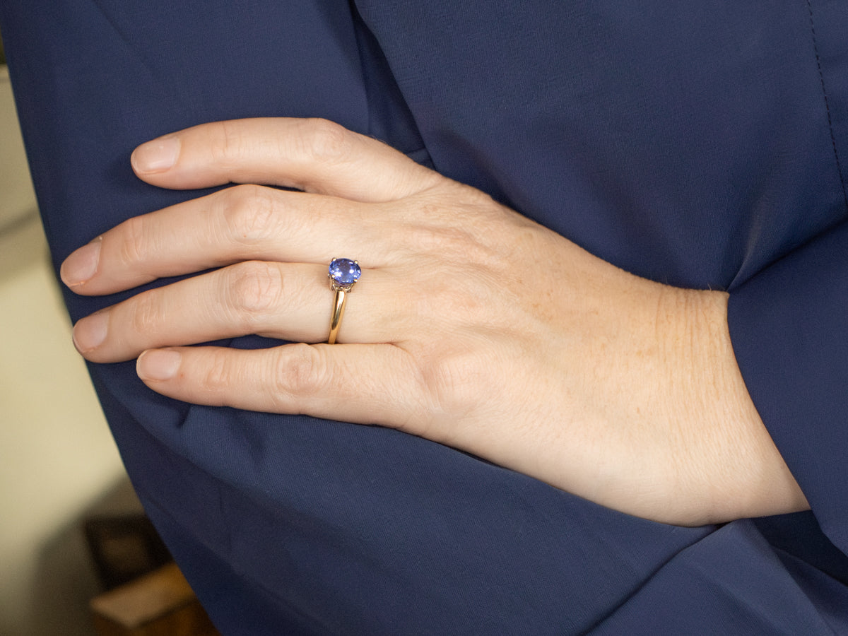 Round Cut Tanzanite Two Tone Gold Solitaire Ring