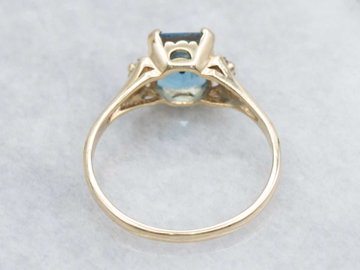 Classic Blue Topaz and Diamond Ring in Yellow Gold