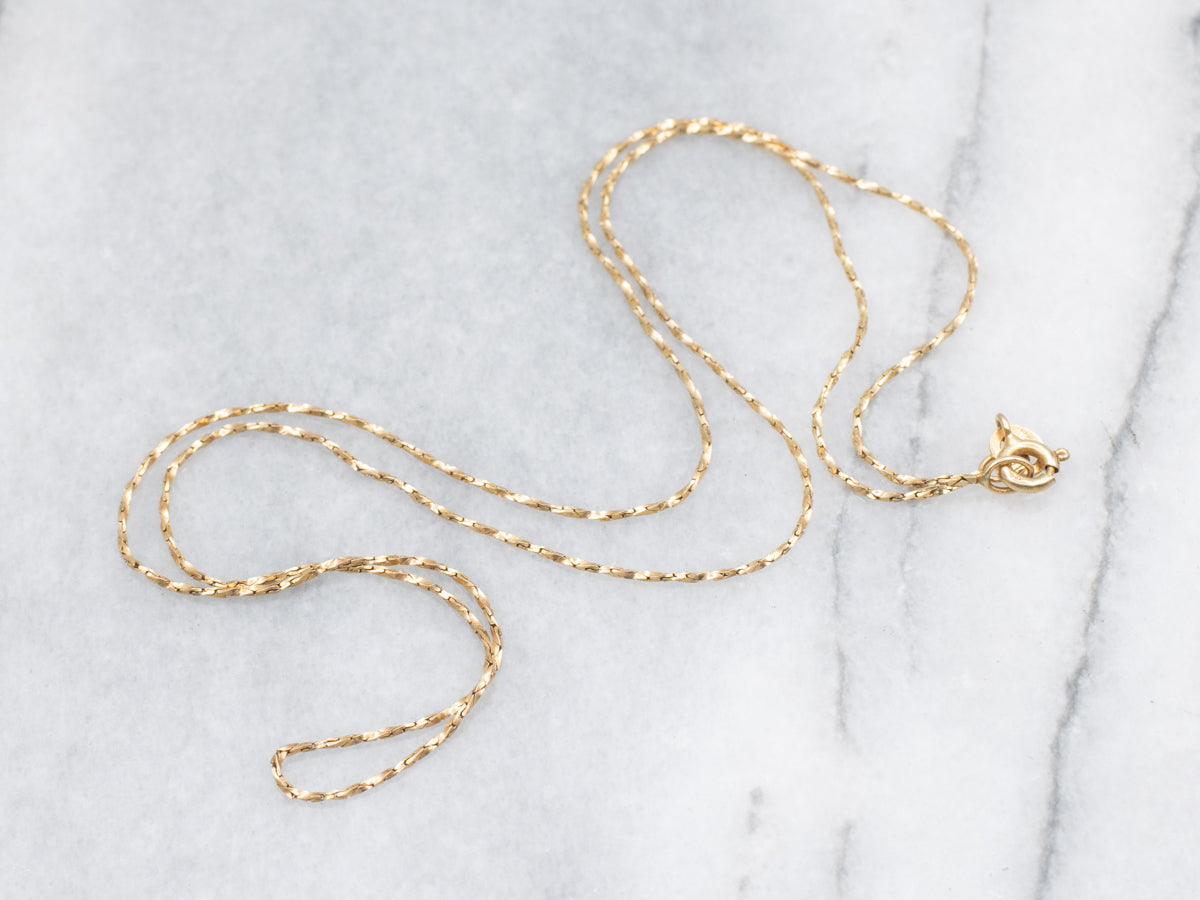 Twisting Yellow Gold Cobra Link Chain with Spring Ring Clasp