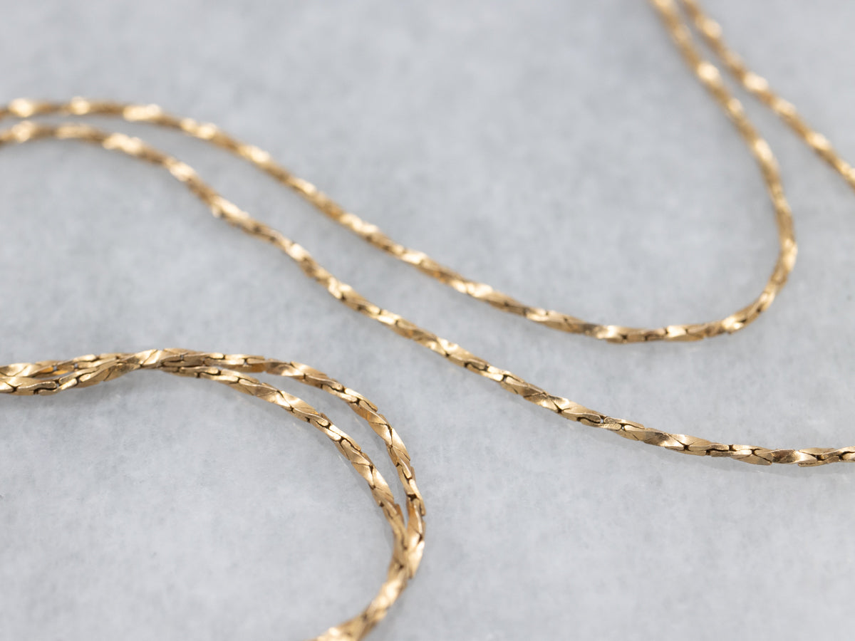 Twisting Yellow Gold Cobra Link Chain with Spring Ring Clasp