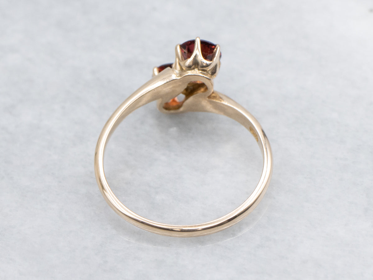 Double Round Cut Garnet and Gold Bypass Ring