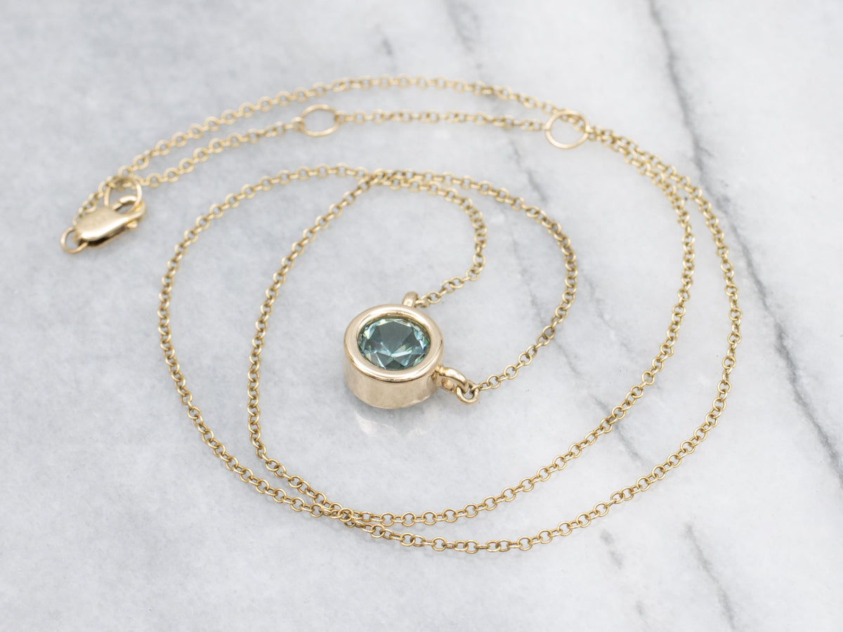 Beautiful Blue Zircon Solitaire and Gold Pendant Necklace