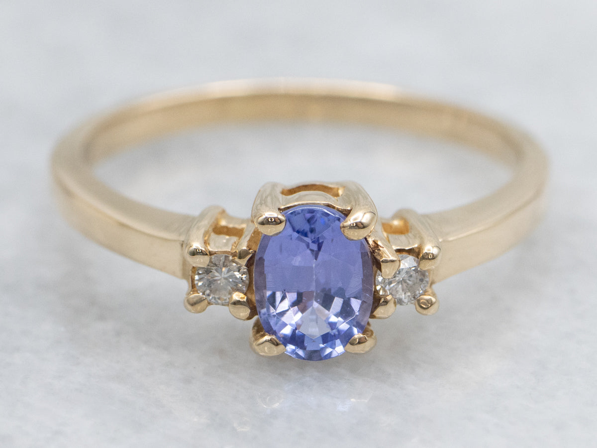 Simple Oval-Cut Tanzanite and Diamond Gold Ring