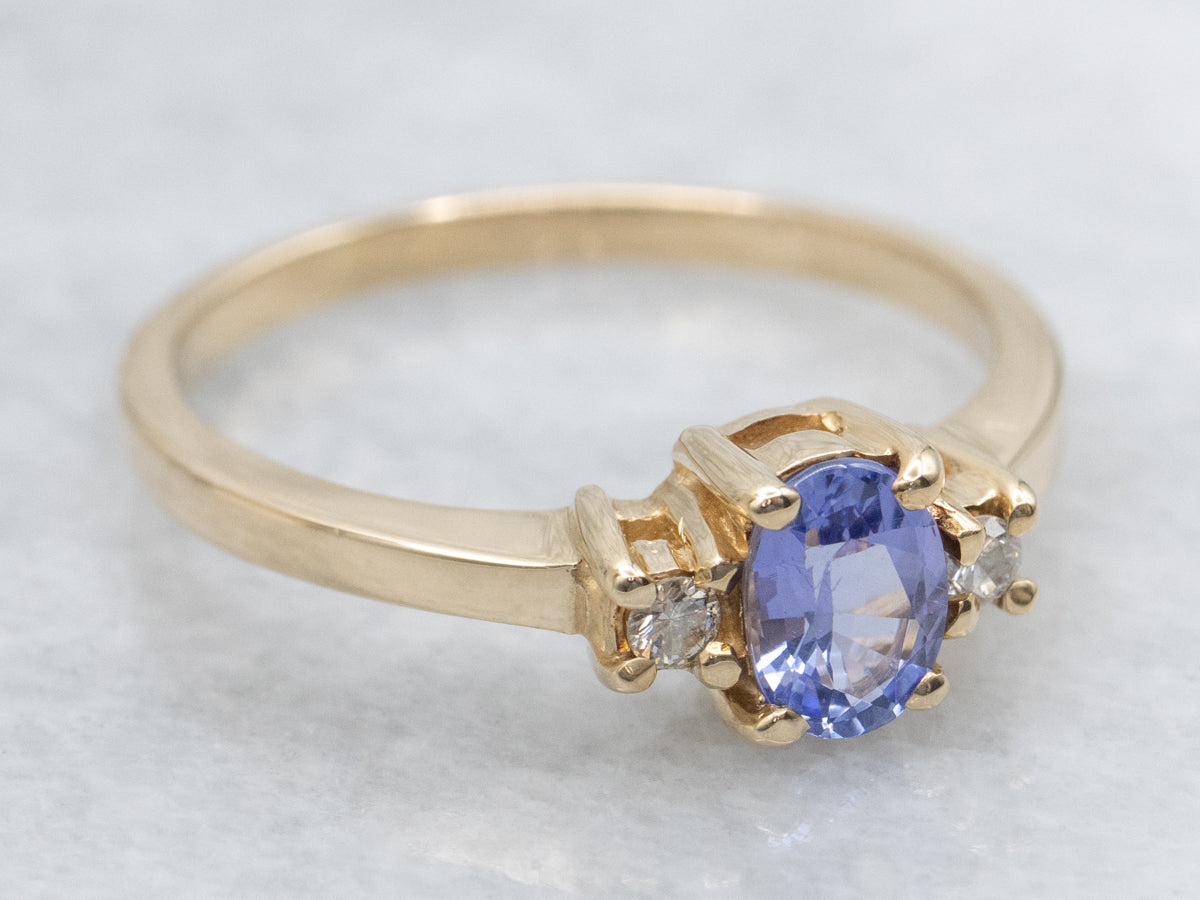 Simple Oval-Cut Tanzanite and Diamond Gold Ring
