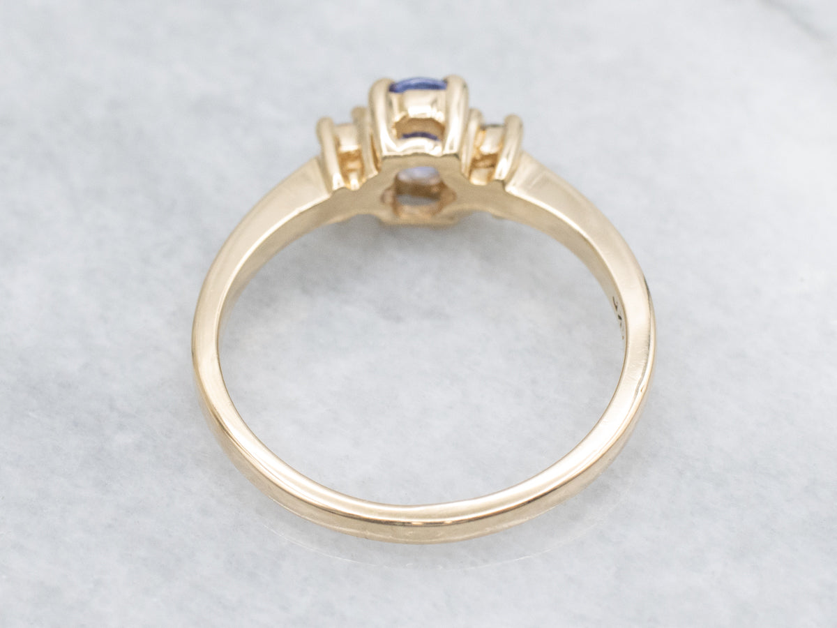 Simple Oval-Cut Tanzanite and Diamond Gold Ring