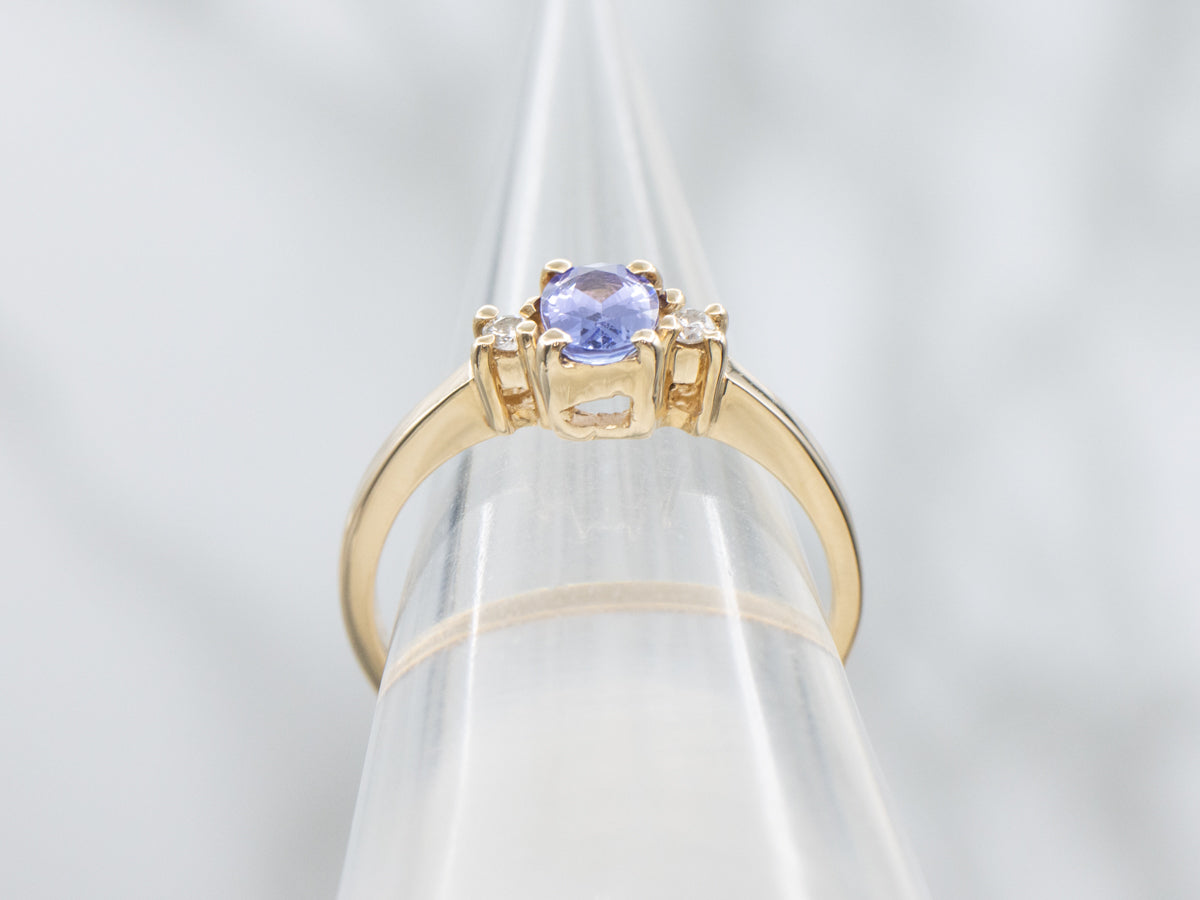 Simple Oval-Cut Tanzanite and Diamond Gold Ring