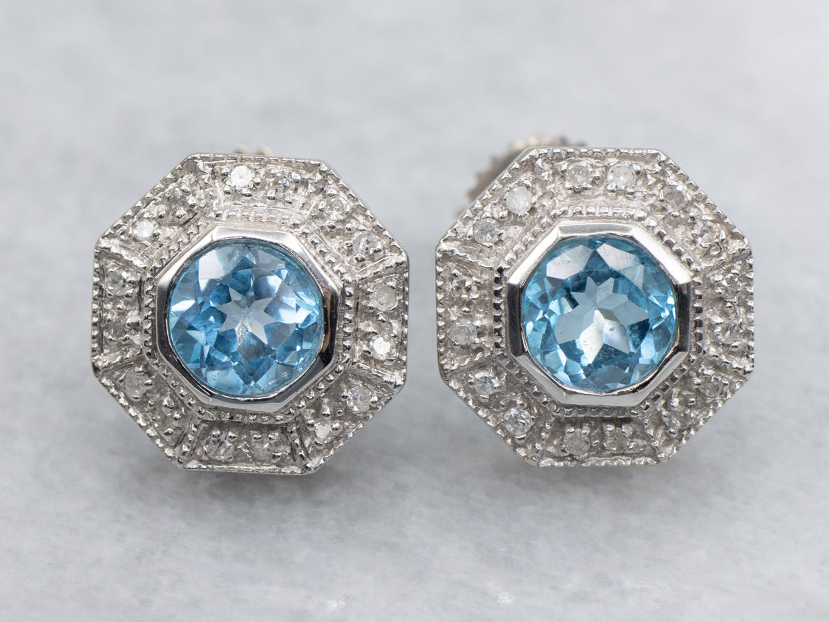 Sparkling Blue Topaz and Diamond Halo Stud Earrings