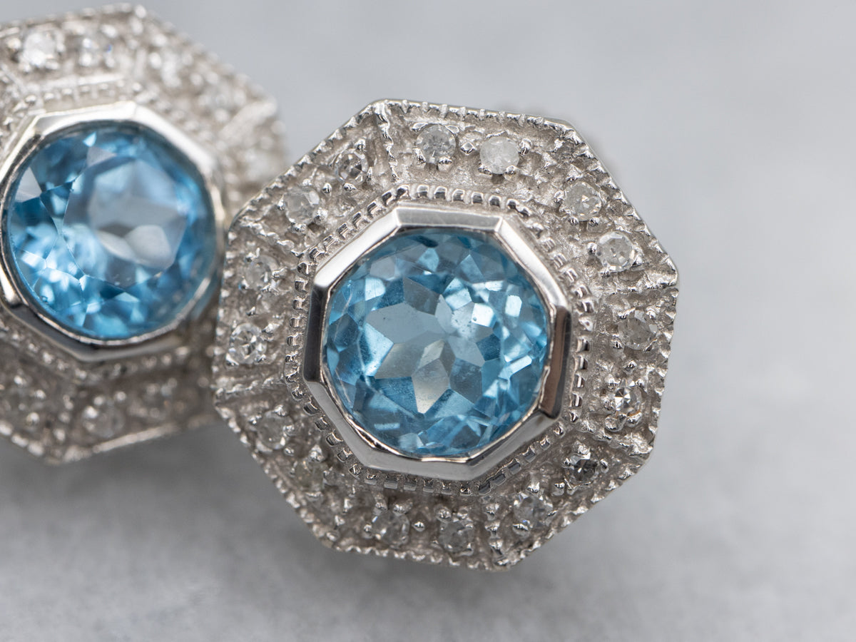 Sparkling Blue Topaz and Diamond Halo Stud Earrings