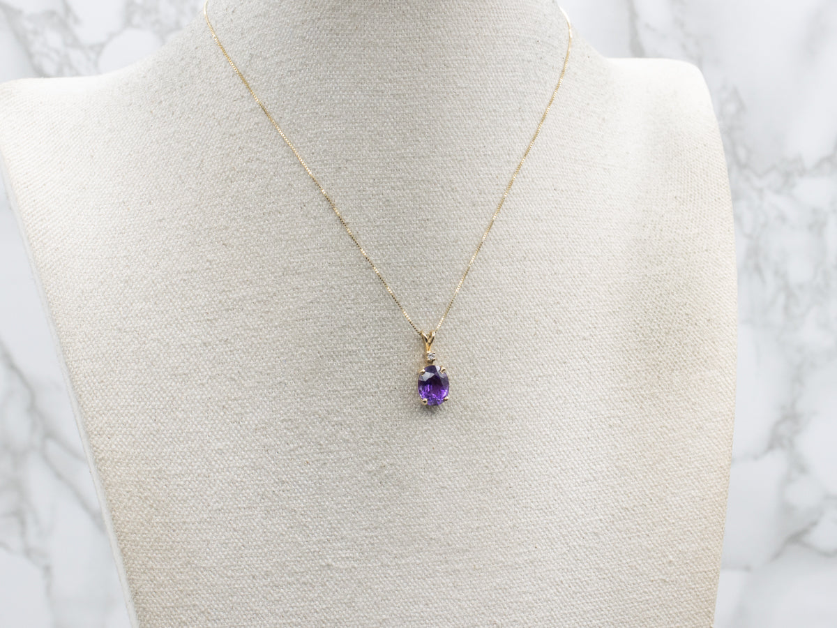 Oval Cut Amethyst and Diamond Yellow Gold Pendant