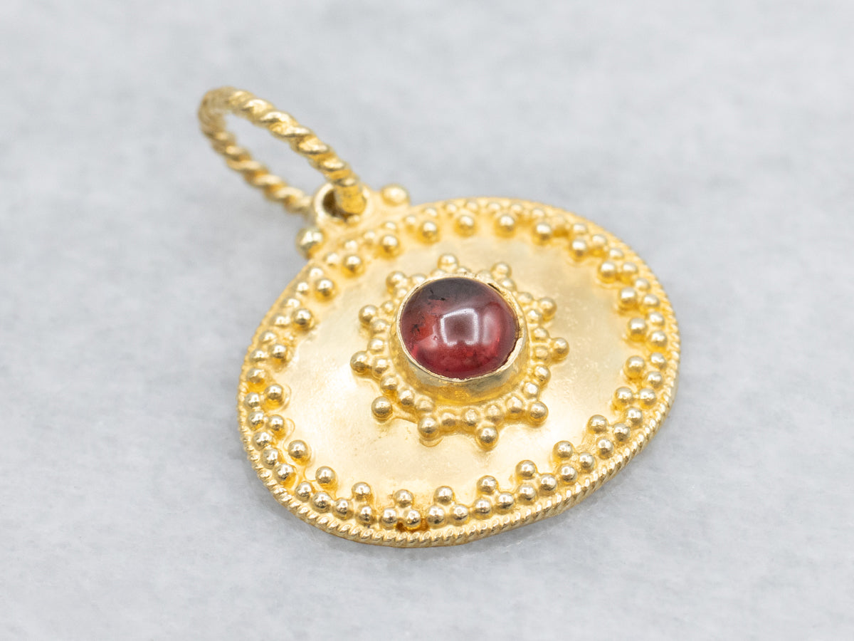 Ornate 18-Karat Gold Garnet Cabochon Pendant