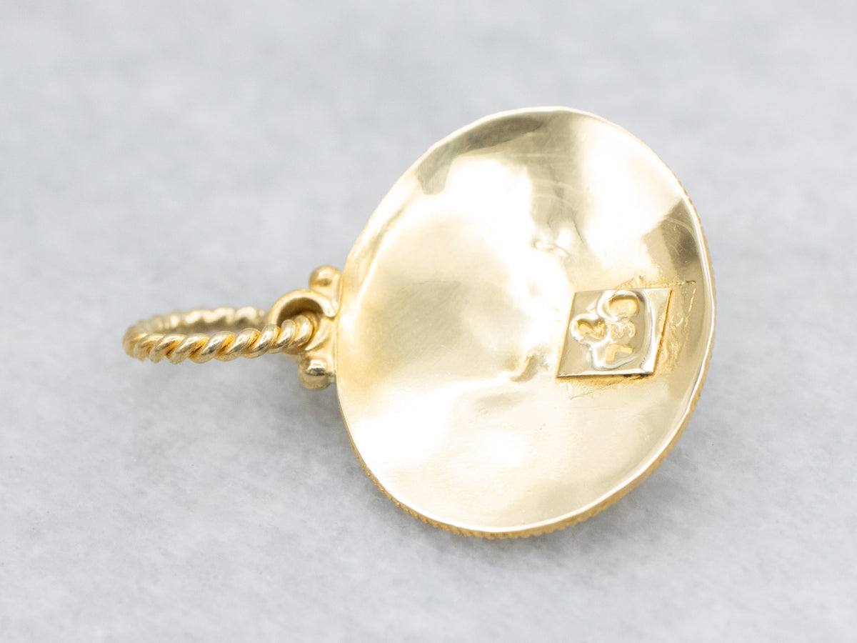 Ornate 18-Karat Gold Garnet Cabochon Pendant