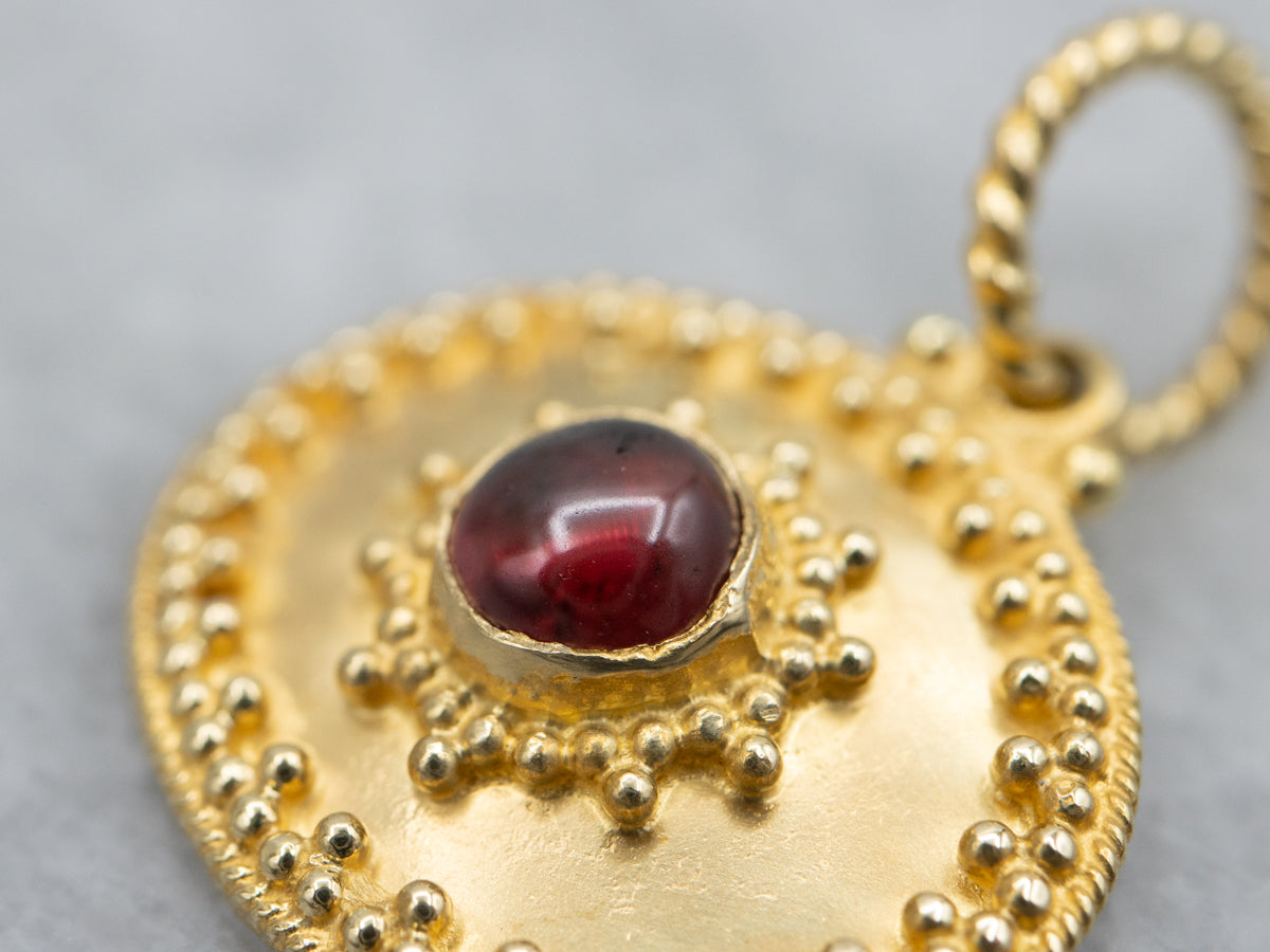 Ornate 18-Karat Gold Garnet Cabochon Pendant